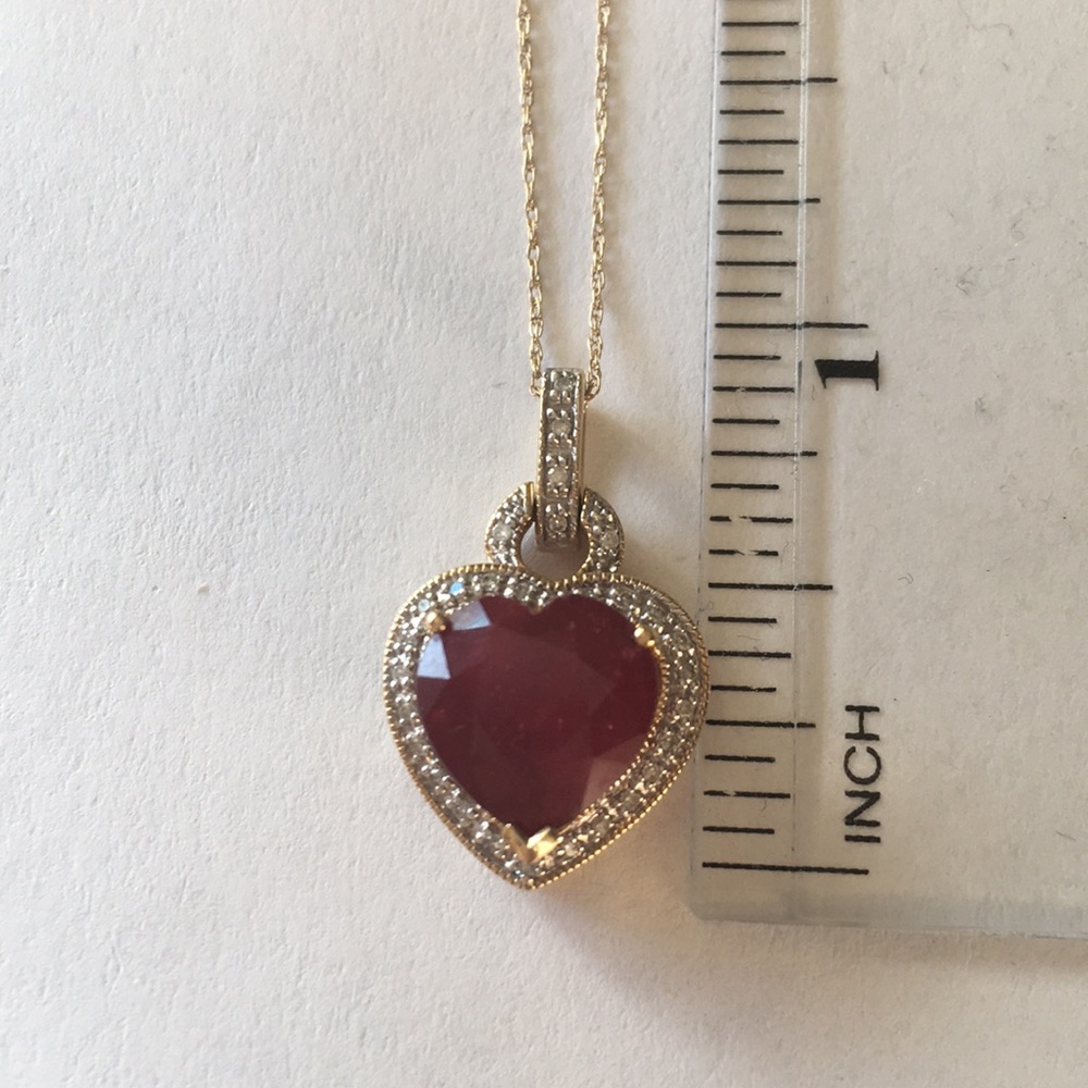 Solid 10 k gold and  ruby pendent